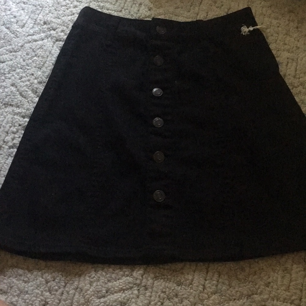 Black button up mini skirt